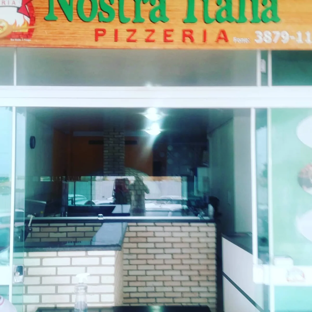 Fachada antiga da Nostra Italia com a identidade visual anterior