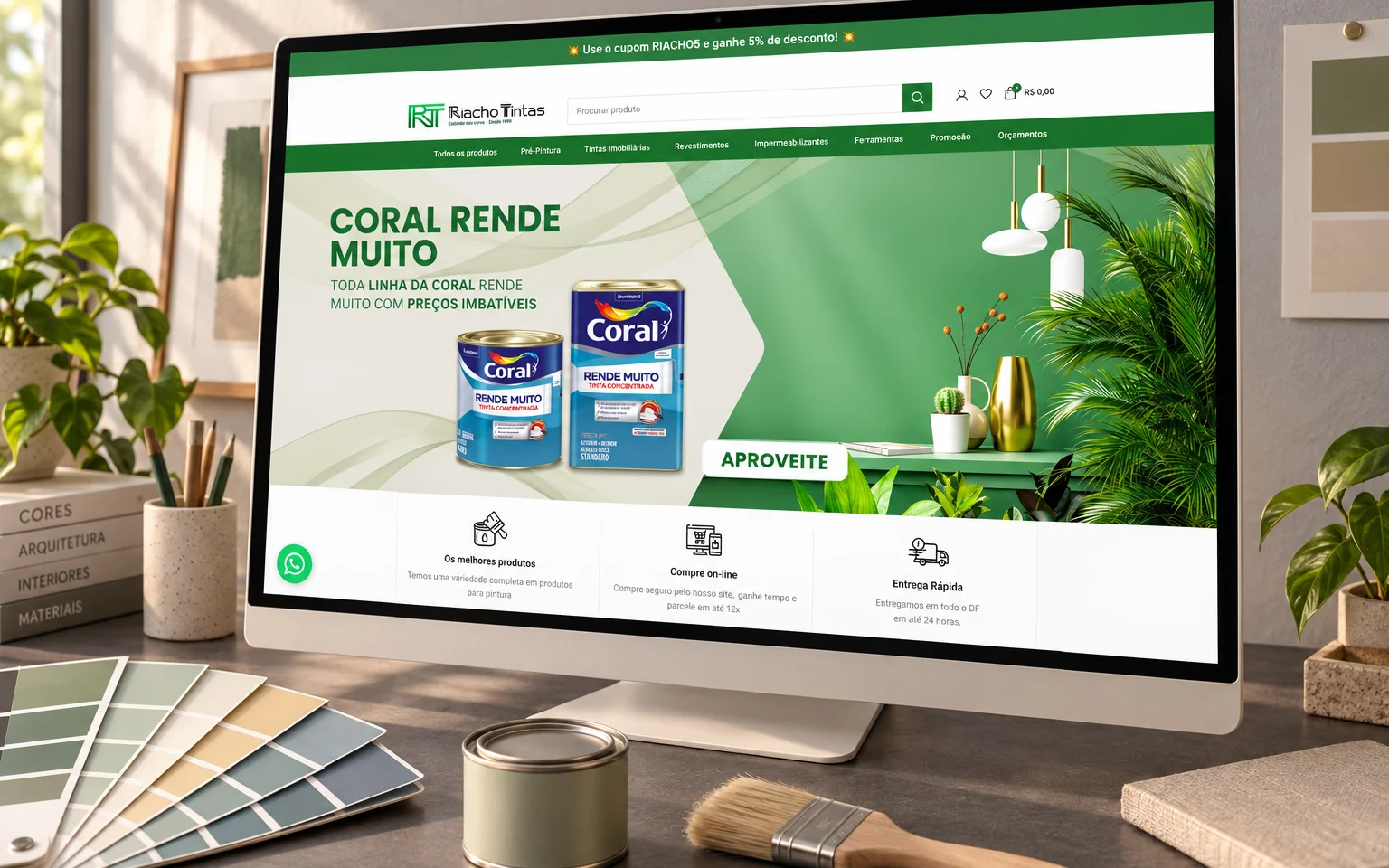 Mockup da loja Riacho Tintas em computador com amostras de cores e materiais